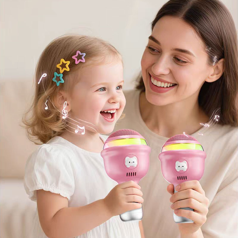 A bright pink kids microphone suitable for toddlers