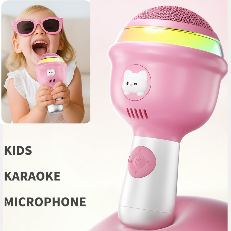 A colorful kids karaoke microphone being held by a child
